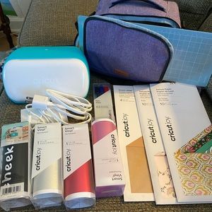Cricut Joy with vinyl, some brand new, some used, carrying case &cutting mat